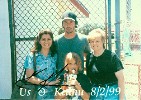 Sandy (dark hair), her daughter Mary, and friend Rose strike a pose with Keanu.  He autographed this the next day.
