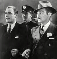 Pat O'Brien (with Adolphe Menjou) in The Front Page