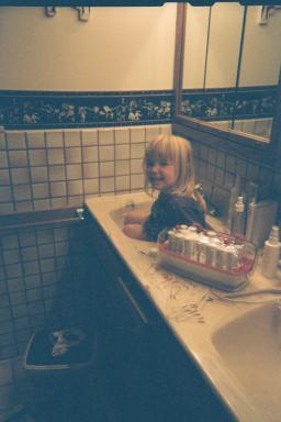 Amber thought she had to have a sink bath!  She always gets her way.