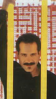 Sinister-looking Tony Shalhoub