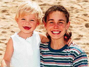 Ekaterina and Daria on Waikiki Beach during a Stars On Ice Tour, taken from the Honolulu Star-Bulletin