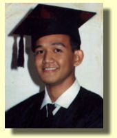 Ervin's graduation picture at CAP College