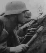 soldier in trench with Stielhandgranate