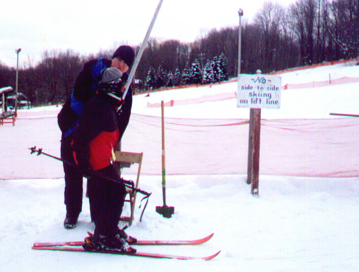 skier loads on the T-Bar