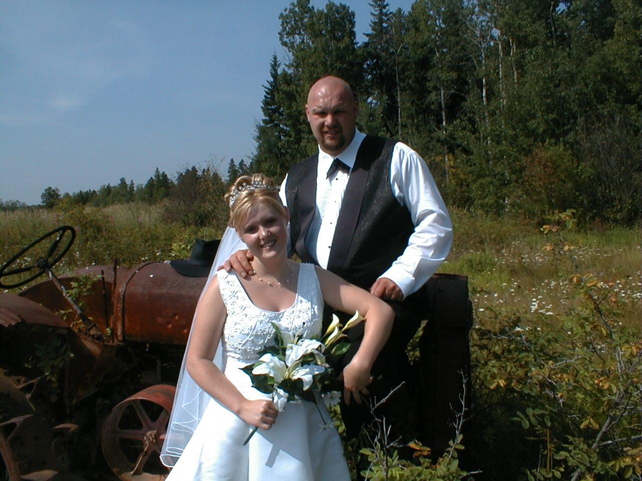 couple with tractor