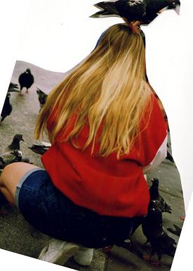 A girl with a pigeon on her head, Trafalgar Square