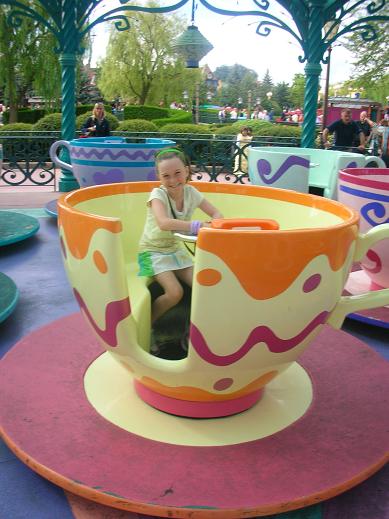 Isabelle in the traditional teacup of Disney, Paris 2006