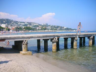 Girl on pier in Cannes