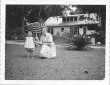 Ellen at age 1 with Grandma in one of Grandma's creations