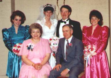 Hank and Liz with their three Children in 1989 and new daughter-in-law