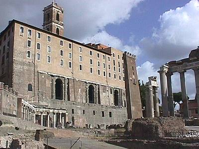 the back of Palazzo Senatorio, and the ancient Tabularium
on which it rests, close the end of the Roman Forum