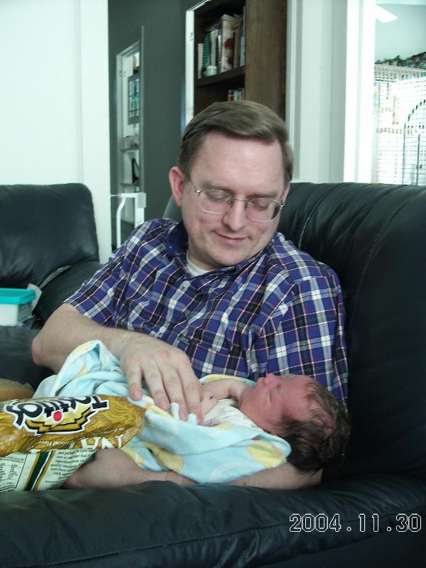 Trey with Daddy, one day old