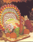 This is a picture of a 						beautiful fan-tailed gingerbread Tom turkey.