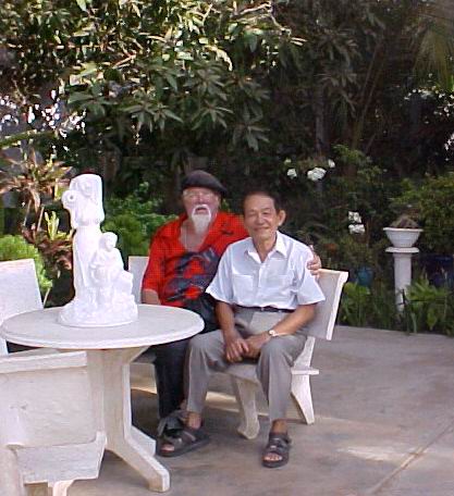 Click to go to full-size photo of MinhChau and Minh_TM in the Whitehouse East Rose Garden