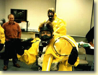 Girl donning af Yellow Hazmat Suit