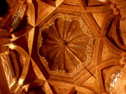 Interior dome within the Cordoba mosque, richly decorated with Arabic calligraphy