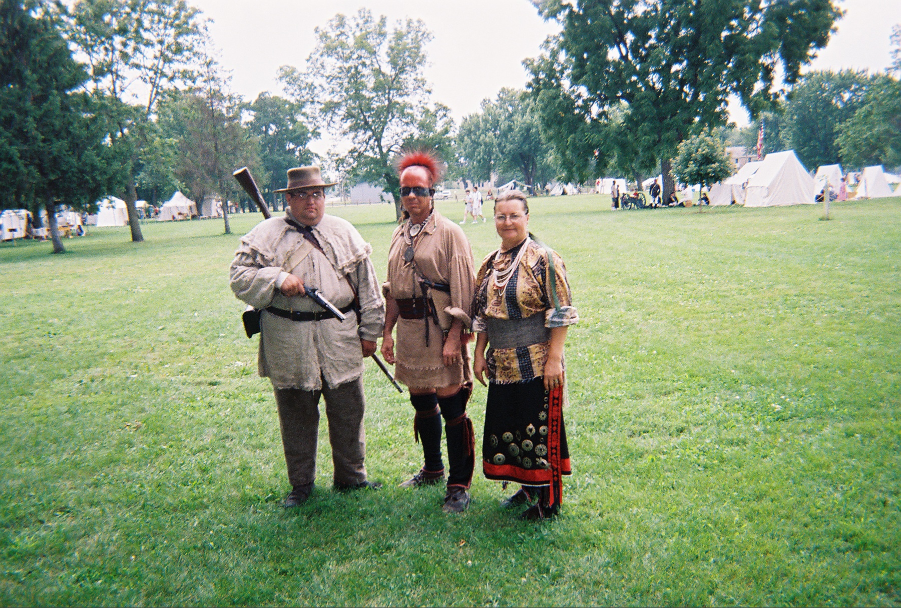 Greg Carter, OLRHS member (left), 
Bob Swanson and Kelly Schott as Sauk warriors. 
Villa Louis State Historic Site, July, 2004.
(Credit: Greg Carter.)