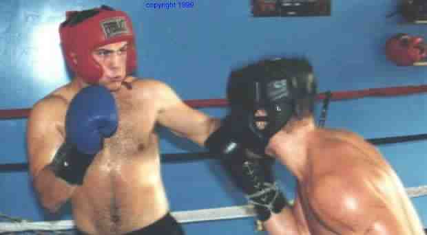 Working with each other does not mean working over each other! Spar safe and smart. Photo copyright 1999. All rights reserved.