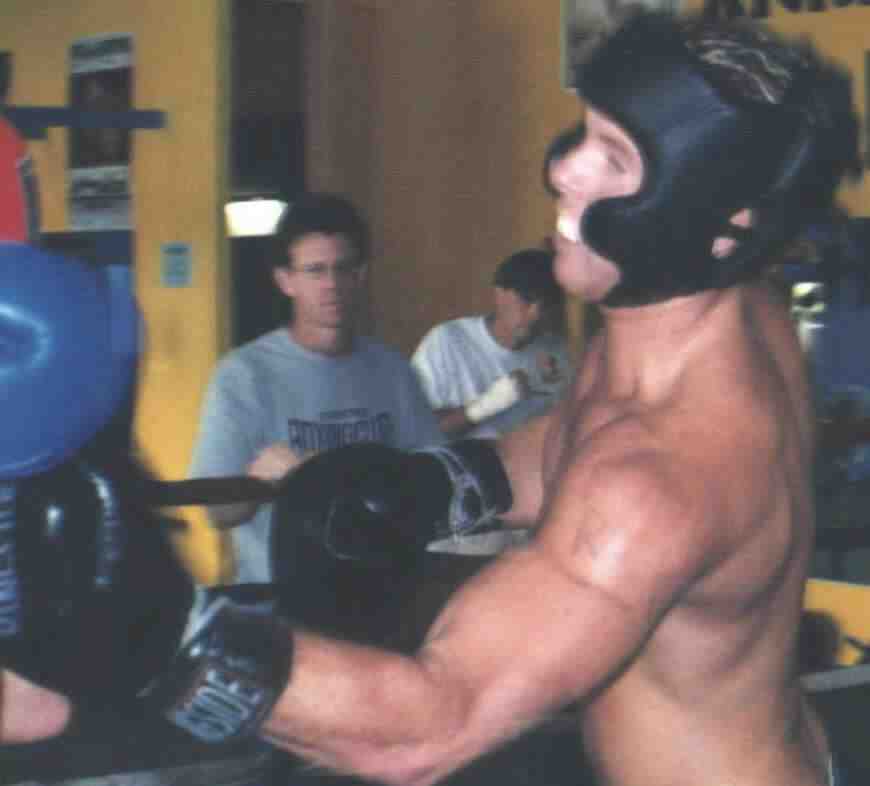 Sparring gives you a chance to practice your combinations and get feedback for improvement. Photogarph copyright 1999. All rights reserved.