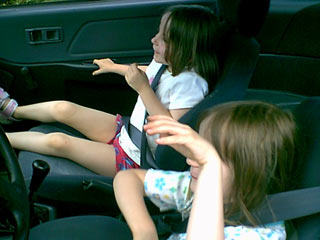 Emma and Maddie in Robert's CRX