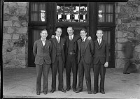 GRAND CANYON LODGE FRONT DESK CLERKS POSED IN FRONT OF THE NORTH RIM LODGE. 20 JULY 1930<br>