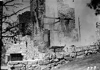 SMOLDERING RUINS OF GRAND CANYON LODGE ON THE NORTH RIM, DESTROYED BY 4 AM KITCHEN FIRE 09/01/32. OUTSIDE FIREPLACE AND STAIRWELL. 04 SEPT 1932<br><br>