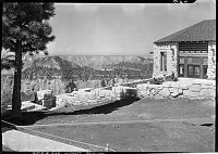 RECONSTRUCTION OF GRAND CANYON LODGE ON THE  NORTH RIM. GROUNDS WORK BY CANYON SIDE PATIO.  BUILDING ALMOST COMPLETED. 15 JULY 1937 NPS PHOTO.<br>
