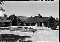 COMPLETION OF GRAND CANYON LODGE, NORTH RIM RECONSTRUCTION. UTAH PARKS CO. DETAIL OF FRONT ENTRANCE DRIVE. 13 JULY 1937 NPS PHOTO<br>