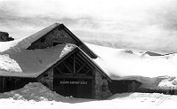 GRAND CANYON LODGE COVERED WITH SNOW. WINTER - NORTH RIM GRCA. UTAH PARK'S CO. CIRCA 1941. NPS.