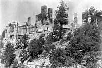 BURNED RUINS OF THE FIRST GRAND CANYON LODGE, NORTH RIM. VIEW FROM SOUTHEAST. 1932. NPS.