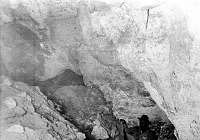 INTERIOR VIEW OF RAMPART CAVE - SHOWING THE EXTRAORDINARY DEPTH ATTAINED BY THE GROUND SLOTH DUNG DEPOSITS - SEPT 1936. NPS