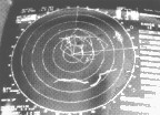 [BW photo: Radar monitor]