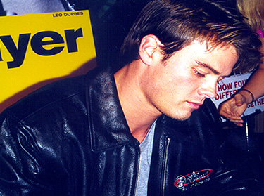 Josh signs an autograph
