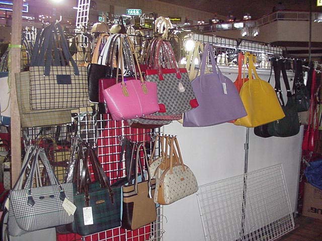 'Branded bags' on sale.  These counterfeit branded bags, sold in Harrison Plaza, range from 400 to 650 pesos.