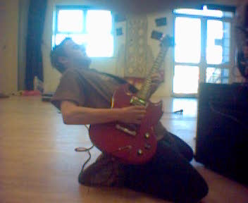 Tom - Guitarist