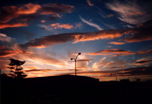 Sunset over Crossroads Mall, by Larah