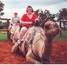 Cheryl and Carol ride camels