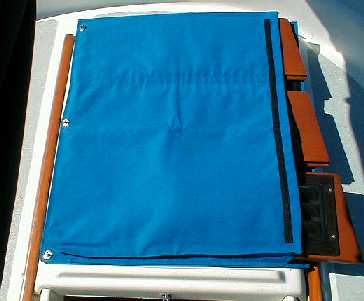 Slide the companionway slats in and close the flap