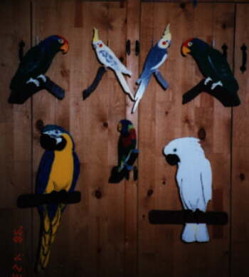 hanging wooden parrots