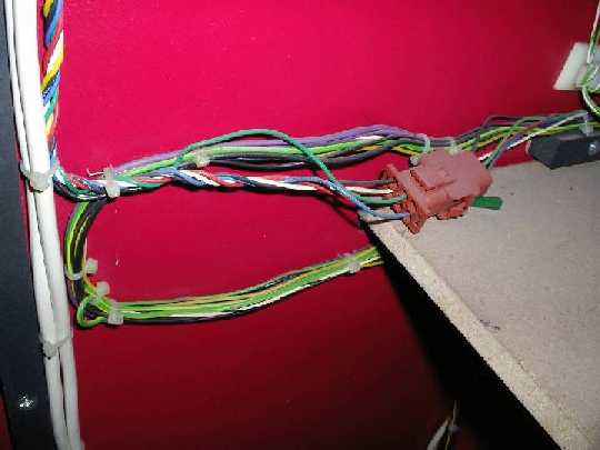 Some cables.  These are on a shelf above the transformer, on the same side of the cabinet as the power cable.