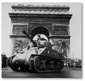 Liberation forces pass by the Arc de Triomphe in Paris