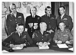 Lt. Gen. Sir Frederick Morgan, Adm. Sir Bertram Ramsay, Air Chief Sir Trafford Leigh-Mallory, Air Chief Marshall Sir Arthu Tedder, Gen. Eisenhower, Gen. Sir Bernard Montgomery