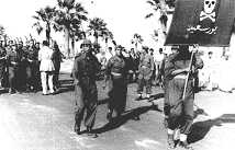 Yahia Carrying Enfield Guarding Commandos Flag