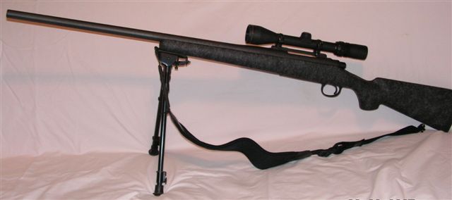 With bipod facing left