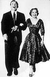 [George and Gracie on joyful stroll]