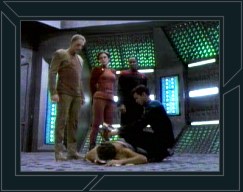 Examining the dead body in the holosuite