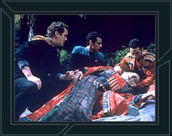 Bashir and O'Brien tending to the dying Sirah