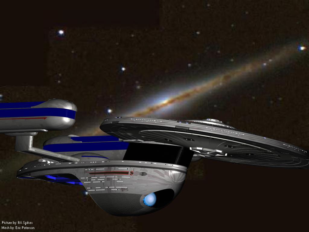 Starboard fore view of the USS Excelsior passing a brown and blue elliptical nebula