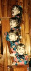 My girls posed on my stairwell in Maxwell, 1993