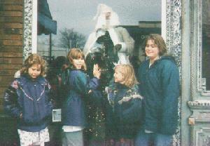 Girls posed in front of a Broad Ripple store window 12/96